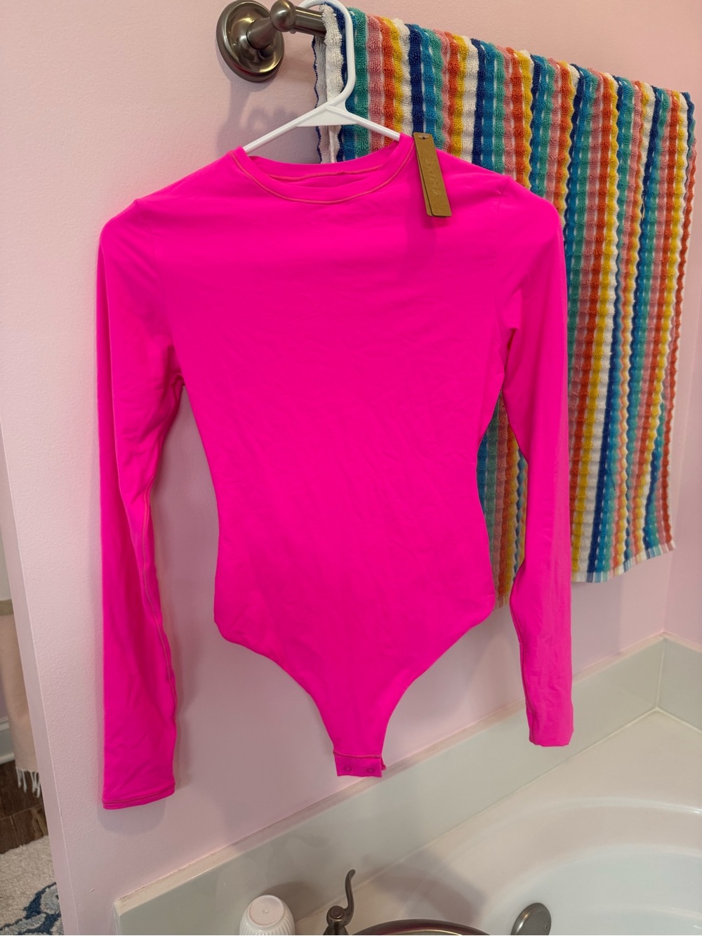 SKIMS Neon Pink Long-Sleeve One-Piece Bodysuit
